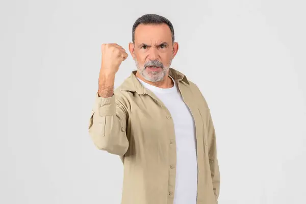 Firm Resolute Elderly Man Clenches His Fist Isolated White Background — Stock Photo, Image
