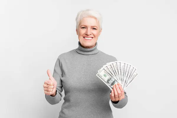 Smiling Senior European Woman Giving Thumbs Money Hand Suggesting Financial — Stock Photo, Image