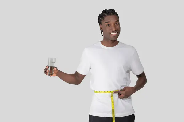 Fit Young African American Man Braided Hair Smiles Holds Dumbbell — Stockfoto