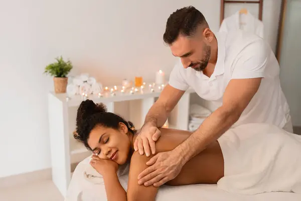Skilled Masseur Providing Arm Massage Spa African American Woman Enjoying — Stock Photo, Image
