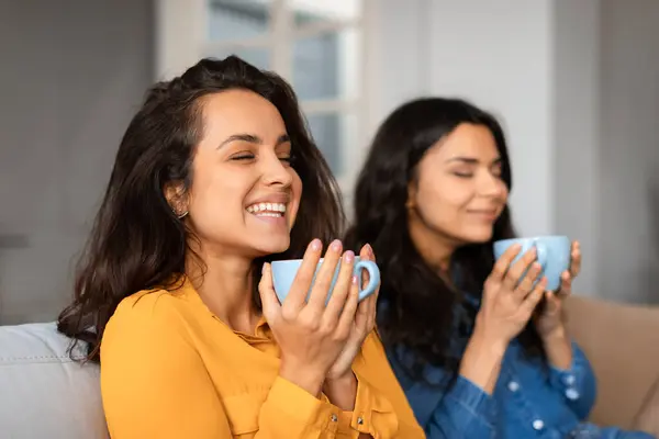 Two Joyful Girlfriends Savor Coffee Time Together Sharing Smiles Comfort — Stock Photo, Image