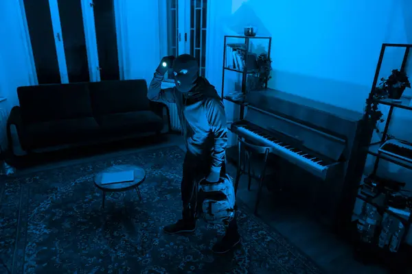 Thief Mask Flashlight Captured While Rummaging Apartment Night Depicting Scene — Stock Photo, Image