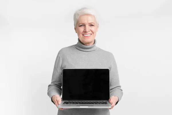 Senior European Woman Holding Laptop Open Blank Screen Suitable Customization — Stock Photo, Image