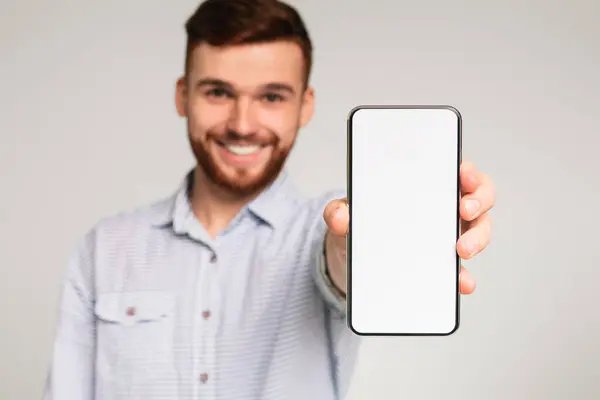 Young Guy Showing His Phone Blank Space Camera Smiling Panorama — Stock Photo, Image
