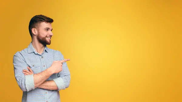 Man Beard Points Something Indicating Direction Highlighting Specific Item — Foto Stock