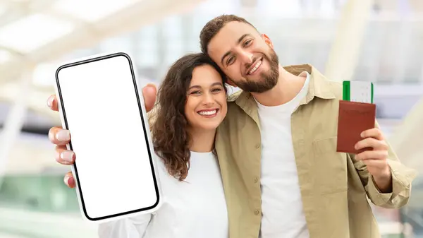 Cheerful Man Woman Shown Close Together Holding Smartphone Blank Screen Royalty Free Stock Images