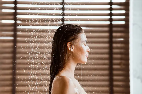 stock image Sexy Woman Enjoing Shower, Standing Under Water Drops, Side View