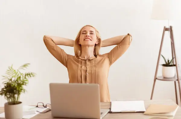 stock image Thinking About Vacation. Woman Having Break At Work, Holding Arms Behind Head