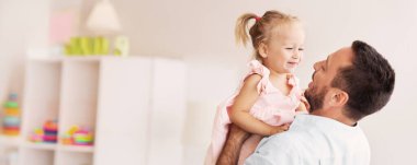 I Love You Dad. Father holding cute little girl with ponytails. Panorama, free space clipart