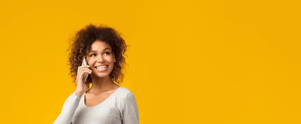 stock image Excited pregnant woman talking on smartphone, having pleasant conversation on pink background, copy space