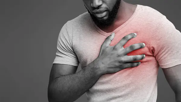 stock image Heart attack. Young black man suffering from severe chest pain. Myocardial infarction disease, cropped