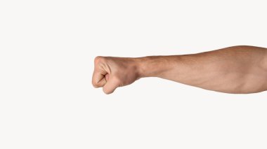 Millennial man clenching fist on light grey background, closeup. Copy space. Panorama clipart