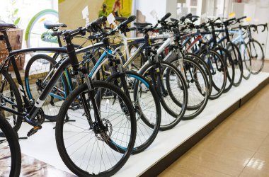 Row of the mountain mtb bicycles in the sports store, bike shopping clipart