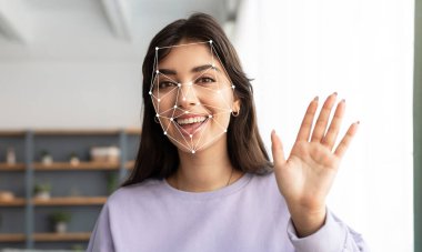 A young woman smiles while waving her hand. clipart