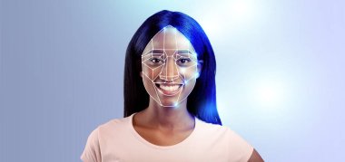 Modern yüz tanıma teknolojisi genç bir kadının yüzünü vurguluyor, tanımlama özelliklerini vurguluyor. İzole edilmiş arkaplan, konu ifadelerine ve teknik uygulamalara odaklanmayı artırır.