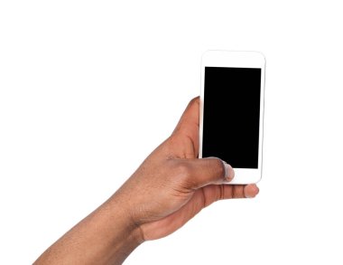 Akıllı telefon ile adam alarak resmi. Siyah beyaz izole fotoğraf çekim ve akıllı telefon tutarak el