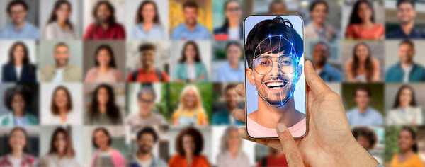 Экран смартфона показывает улыбающееся лицо, которое сканируется на предмет идентификации, в окружении коллажа из разных людей на заднем плане. Это означает прогресс в технологии и распознавании идентичности.