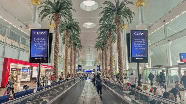 stock image DUBAI, UAE. 16 SEPTEMBER 2023. Dual horizontal escalators smoothly guide travelers to the departure gate in the airport.