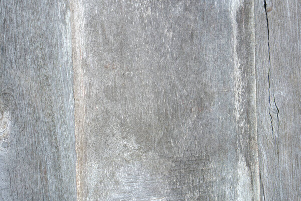 Old wooden background with cracks from long aging