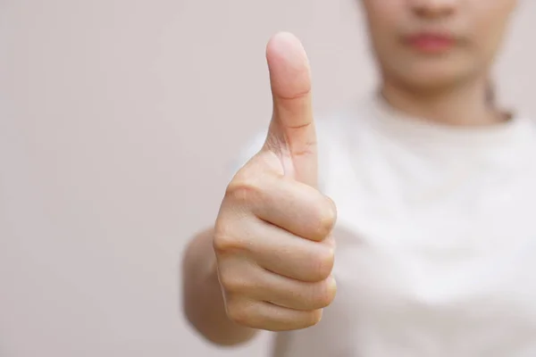 Asian Woman Raising Hand Showing Great Sign — Stock Photo, Image