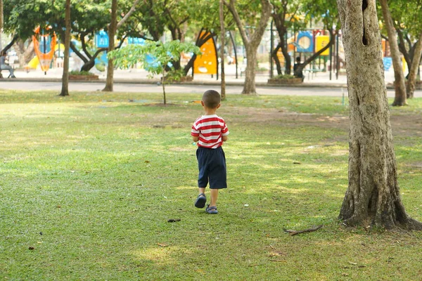 stock image boy running in the garden