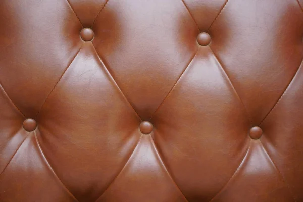 背景型褐色沙发垫 — 图库照片
