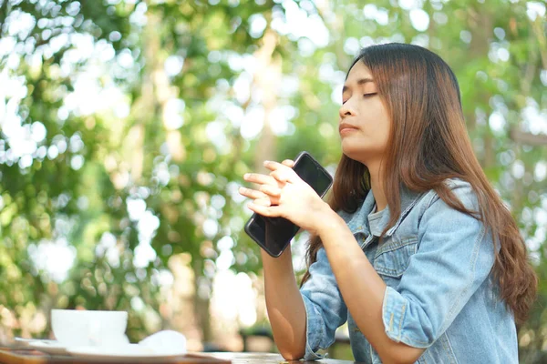 stock image Woman thinking hard as profits decline in coffee cafe