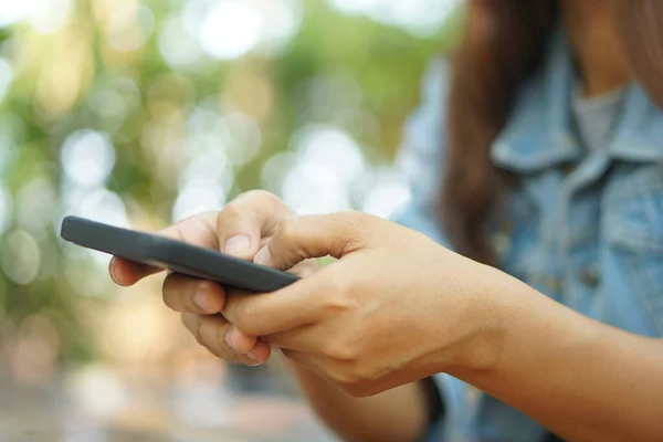 stock image phone in woman hand using phone