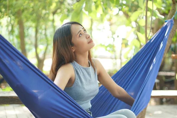 stock image Woman sitting in a hammock in a coffee shop