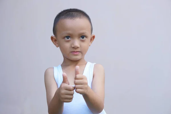 stock image Asian boy great thumbs up