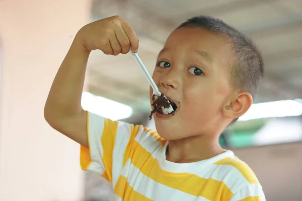 Boy Eating Chocolate Cake Smeared Mouth Stock Picture
