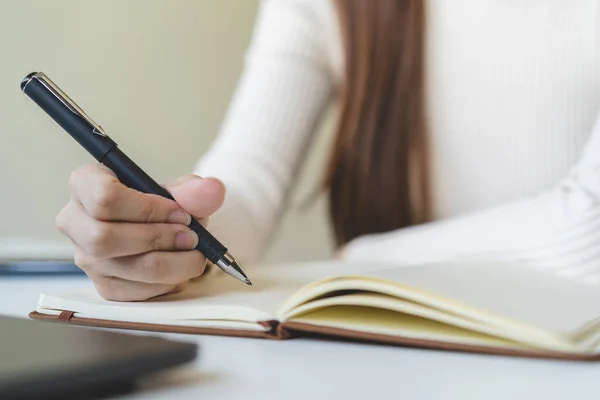 Closeup Hand Woman Writing Ideas Notebook — Zdjęcie stockowe