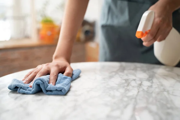 Asian Woman Cleaning Table Surface Towel Spray Detergent — Foto Stock