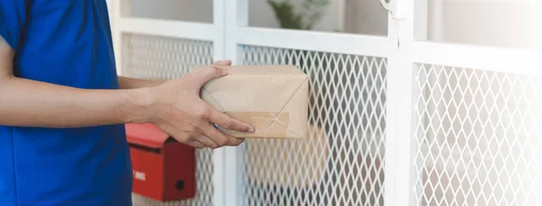 delivery man shipment package boxes to receiver to home