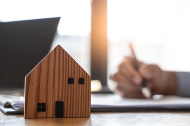 Client signing a property leasing contract.