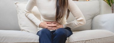 woman have stomach pain from menstruation.