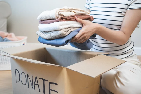 Person Separate Clothes Donation Boxes Wait Give Volunteer Charity Share — Stockfoto