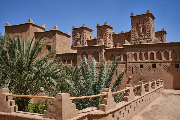 stock image Kasbah Amridil. in the palm grove of Skoura, Morocco. Traditional adobe, thatch and brick architecture.