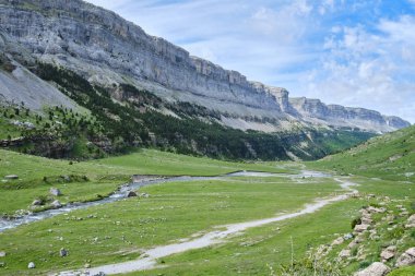 Valley of Ordesa National Park and Monte perdido on a sunny day clipart