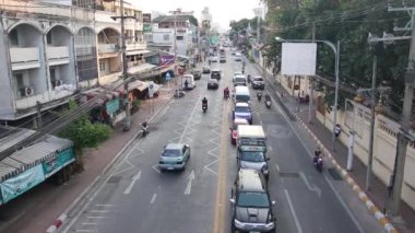 The traffic situation on a busy road in the immediate vicinity of a school in Thailand Asia 