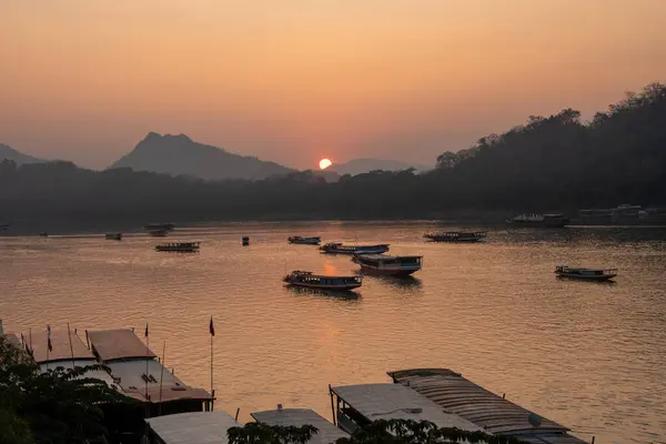 stock image Wooden Boats at the Mekong River of Luang Prabang in Laos Southeast Asia during the Sunset Time