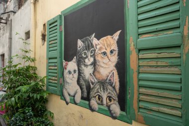 Street art in the different streets and alleys of George Town on Penag Island in Malaysia South East Asia clipart