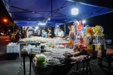 street life with buildings and people in Soi Buakhao of Pattaya district Chonburi in Thailand Asia clipart