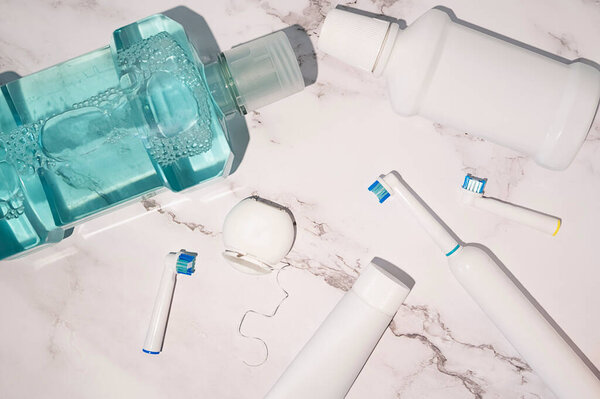 Oral Hygiene Solution Kit Electric Toothbrush Floss Toothpaste Tube Mouthwash Stock Picture