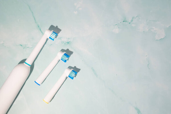Electronic Toothbrush Brush Heads Marble Background Oral Hygiene Morning Routine Stock Photo
