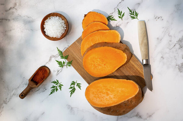 Raw Sweet Potato Batatas Slices Wooden Cutting Board Placed Marble Royalty Free Stock Images