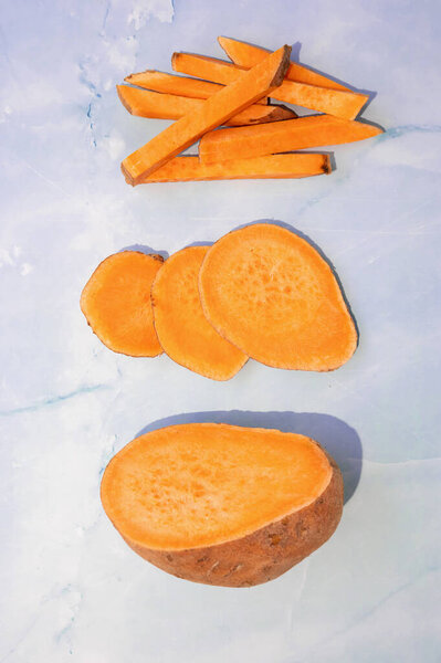Slices Raw Sweet Potato Yam Light Marble Surface Showcasing Nutritious Stock Picture