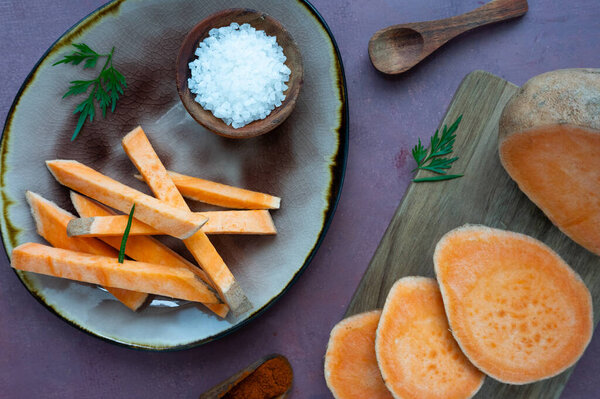 Raw Sweet Potato Yam Cut Slices Arranged Plate Cutting Board Royalty Free Stock Photos