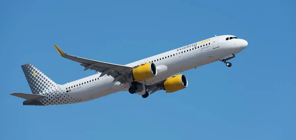 stock image Tenerife, Spain august 5st, 2023. Vueling Airlines Airbus A321neo. Vueling Airlines flies in the blue sky