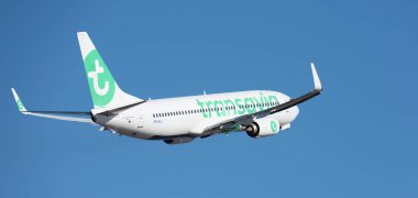 Tenerife, Spain January 21 st, 2024 Boeing 737-8K2. Transavia Airlines flies in the blue sky clipart